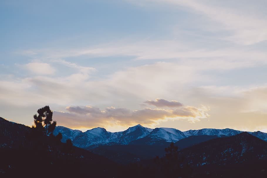 mountain, mountains, mountain range, peaks, sky, sunset, clouds HD wallpaper