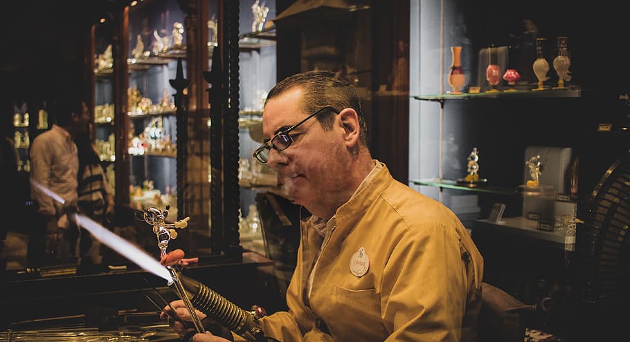 man making figurine inside room, person, human, people, pub, artist HD wallpaper