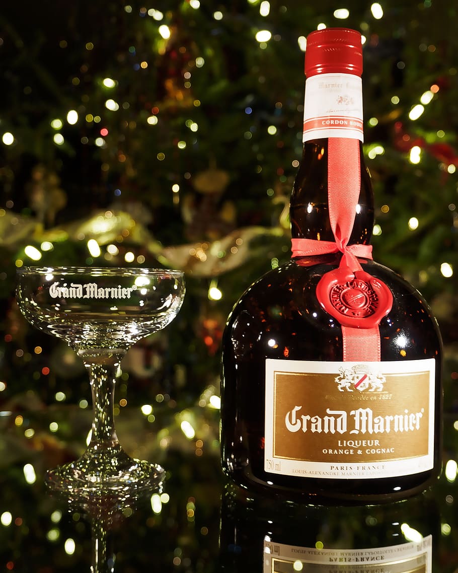 Grand Marnier with glass, bottle, pouring, drink, congnac, alcohol
