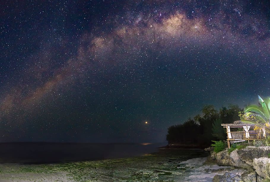 sea under starry sky, milky way, galaxy, astronomy, night, outdoors HD wallpaper