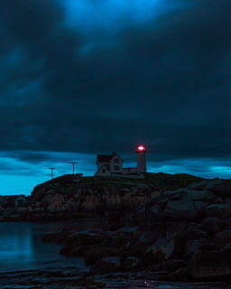 lighthouse beside body of water, coast, shore, rock, cloudy, storm HD wallpaper