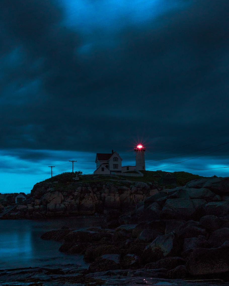 lighthouse beside body of water, coast, shore, rock, cloudy, storm, HD wallpaper