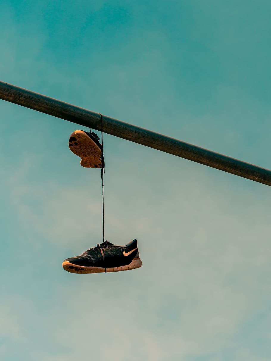 Shoes on wires Stock Photos, Royalty Free Shoes on wires Images |  Depositphotos