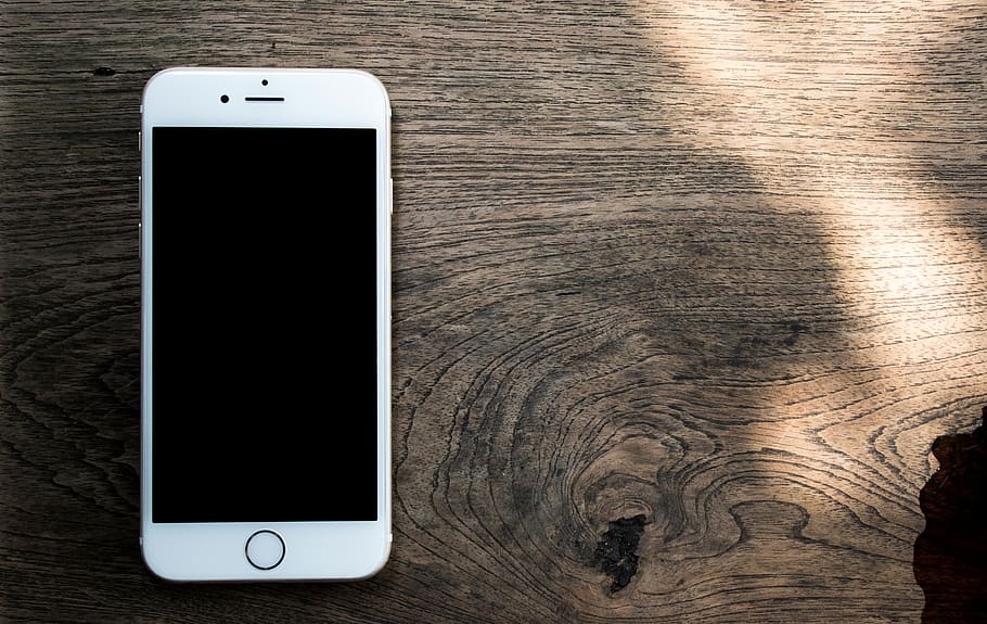 iphone  6, iphone 6s, white iphone, wooden table, closeup, frontview