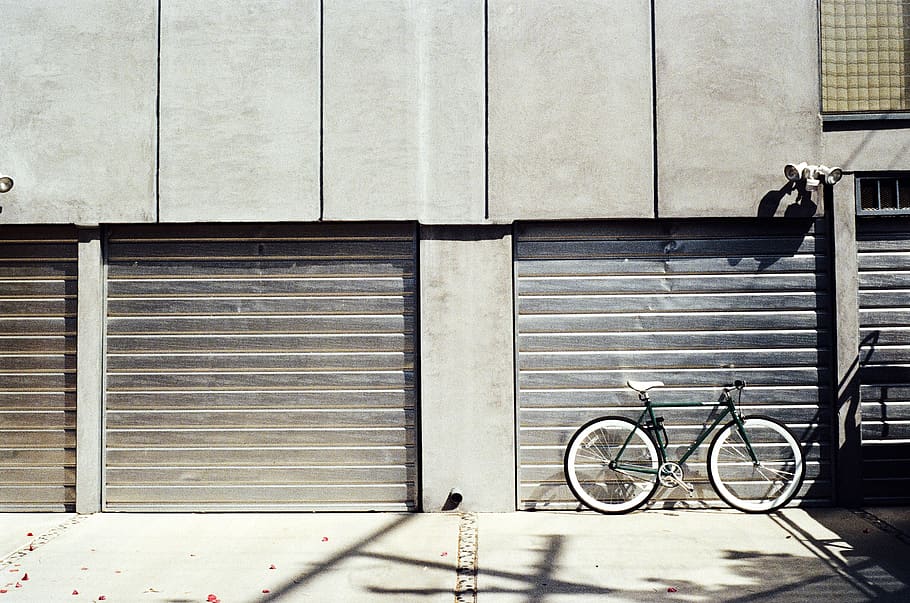 Green Bike Near Roll-up Door, bicycle, garage, architecture, built structure, HD wallpaper