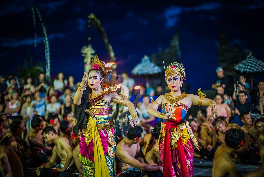 Two Women Dancing While Wearing Dresses at Night Time, bali, celebration