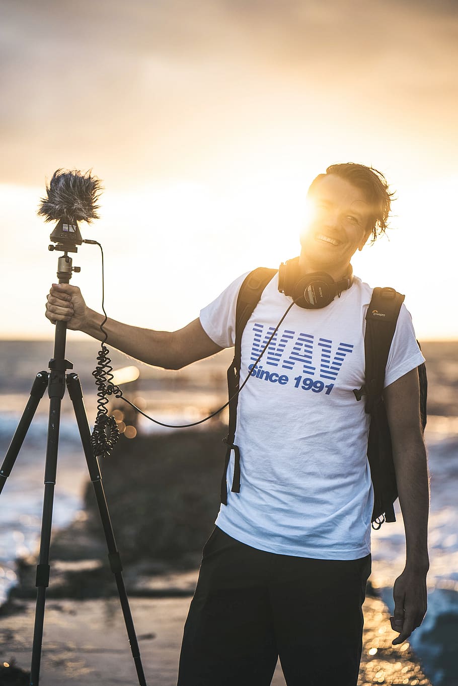 man holding tripod stand, one person, real people, young adult HD wallpaper
