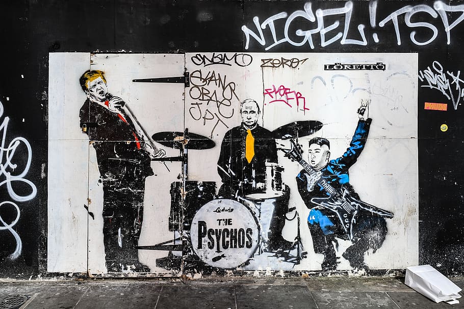The Psychos graffiti, person, human, musician, musical instrument