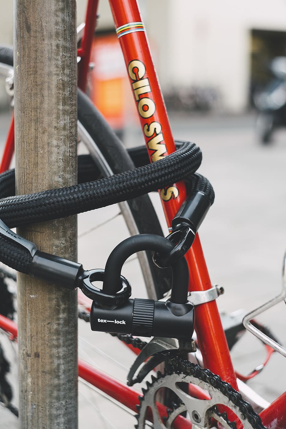 Red Bicycle With Black Lex-lock Cable, bike, chain, city, daytime, HD wallpaper
