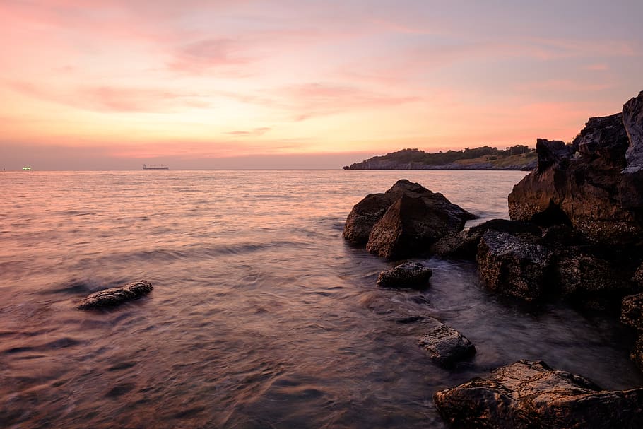 Body of Water Beside Rock Formation, beach, clouds, horizon, idyllic HD wallpaper