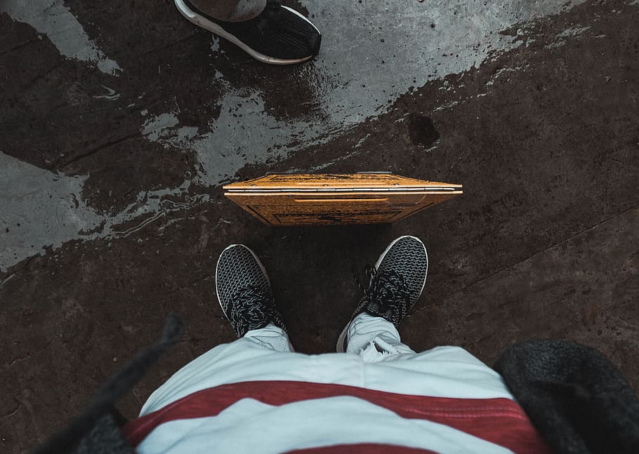 person wearing pair of black sneakerrs, feet, floor, wet, street, HD wallpaper