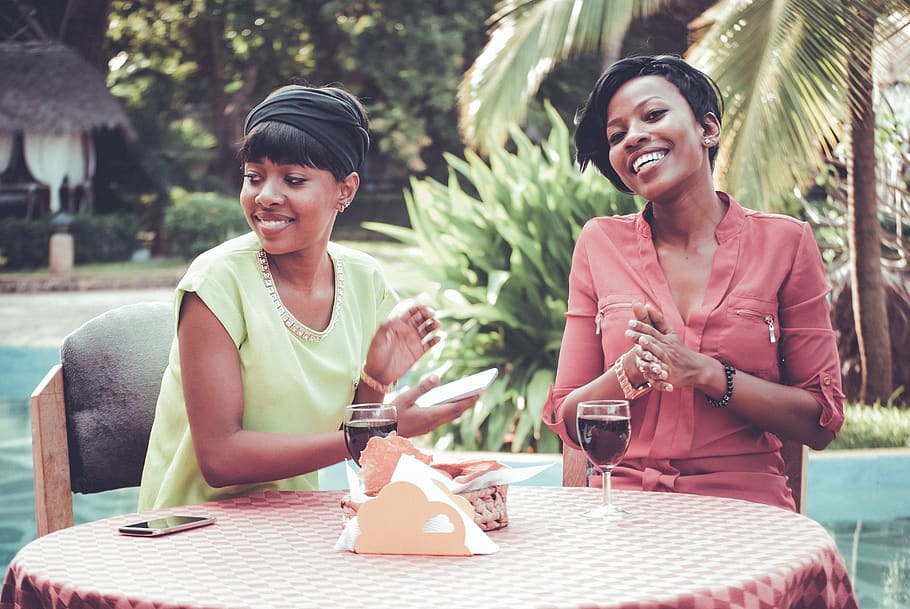 Women Sitting in Front of Table, blurred background, chairs, daylight HD wallpaper