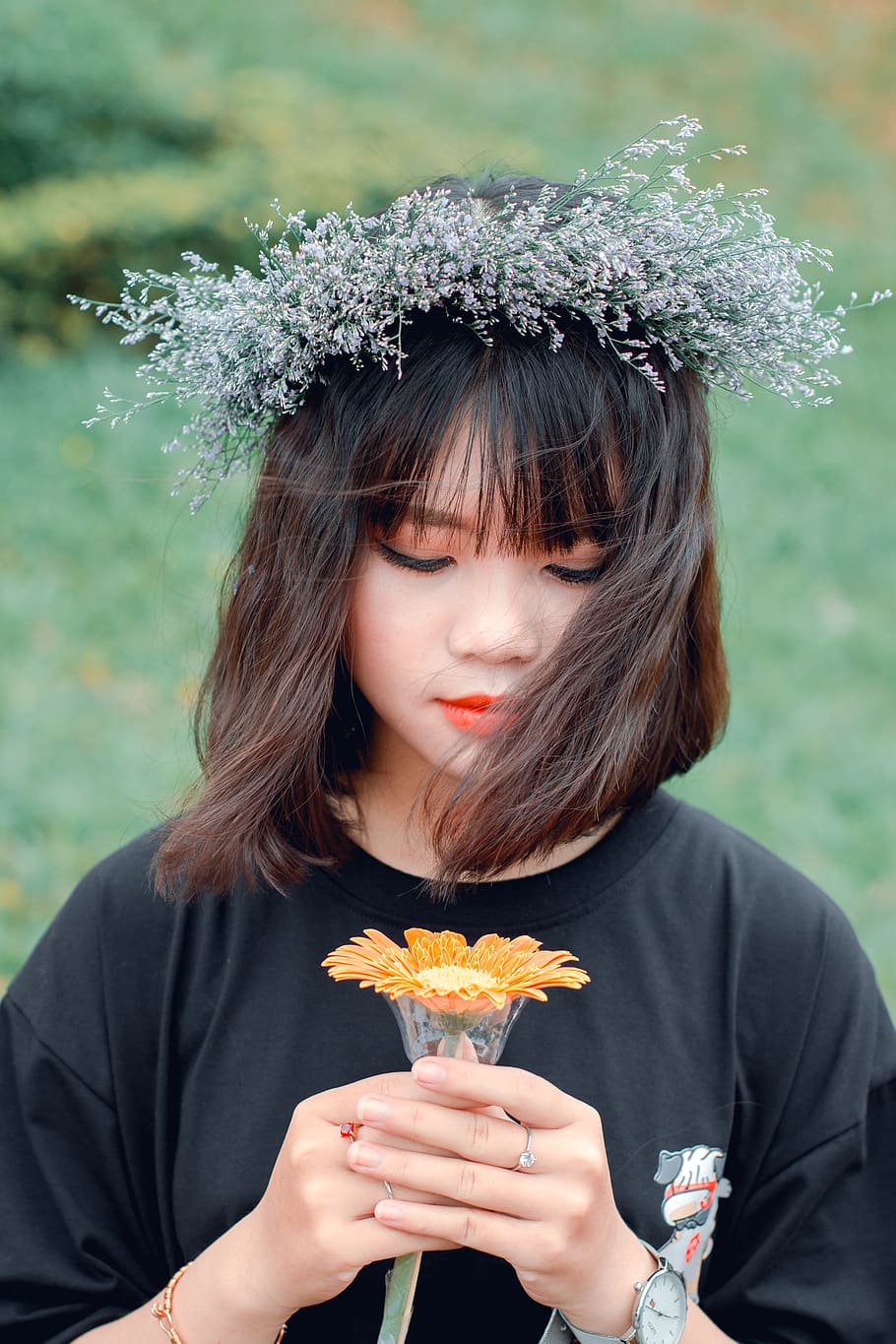 Woman Holding Yellow Gerbera Flower and Wearing Flower Headpiece HD wallpaper