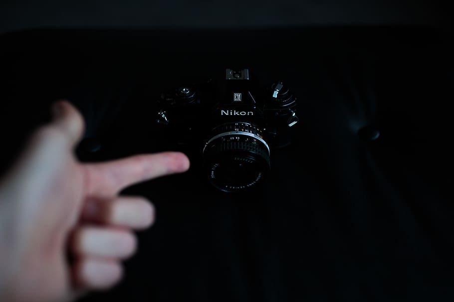 black Nikon DSLR camera, electronics, photography, finger, person HD wallpaper