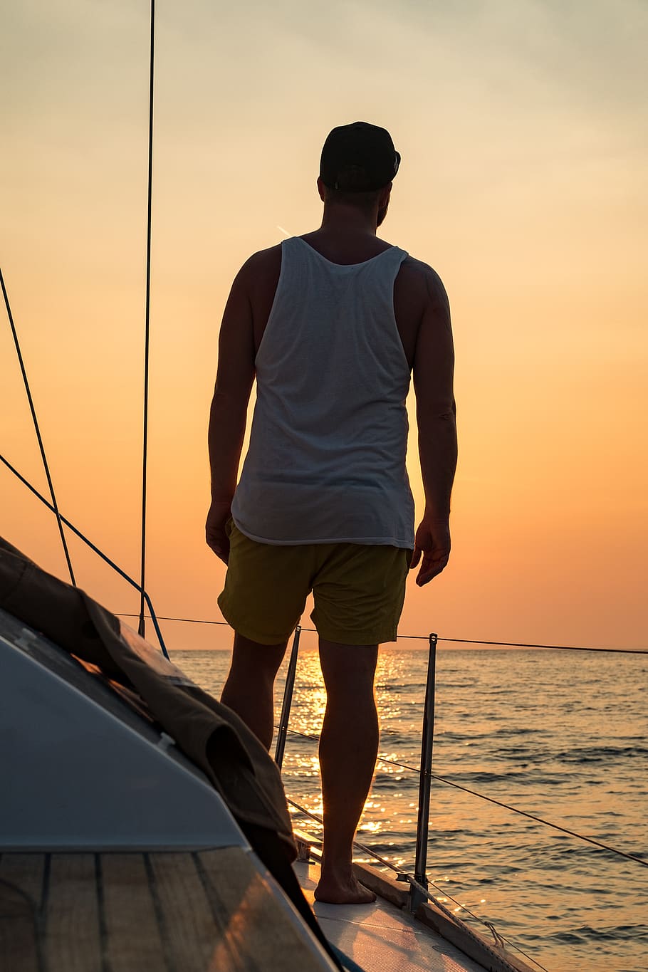 sea, sun, sunset, sailing, boat, water, real people, sky, one person HD wallpaper