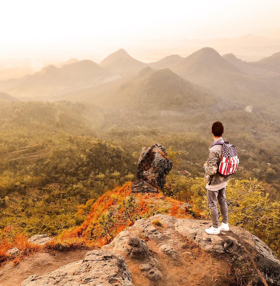Man Standing on a Mountain Summit, backpack, climber, clouds HD wallpaper