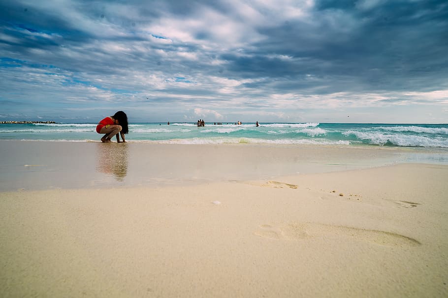 Woman Kneeling in Front of Body of Water, beach, child, clouds HD wallpaper