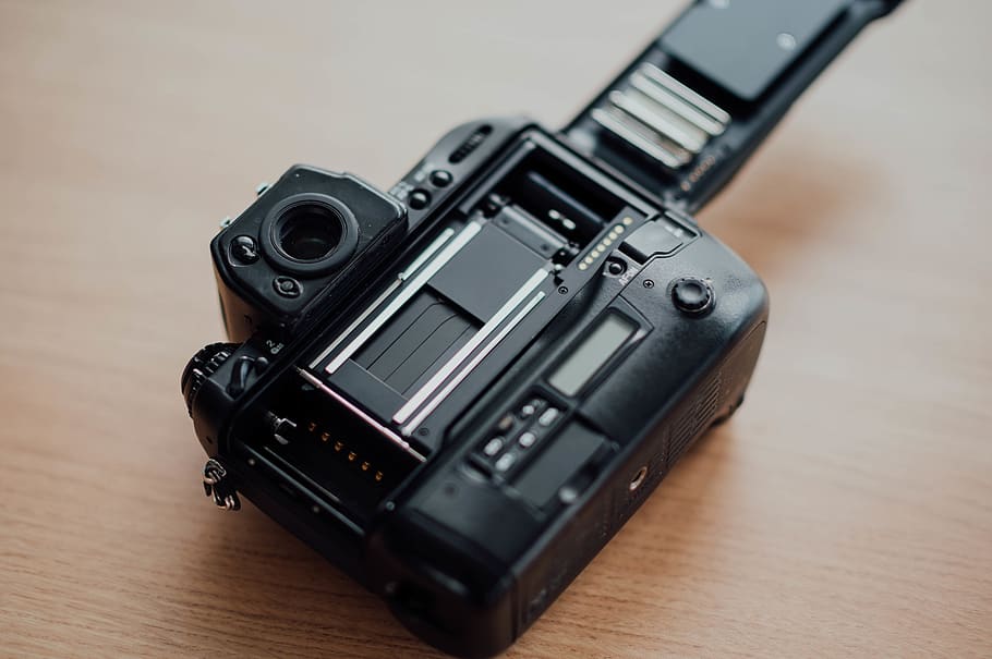 black SLR camera on brown surface, electronics, video camera HD wallpaper
