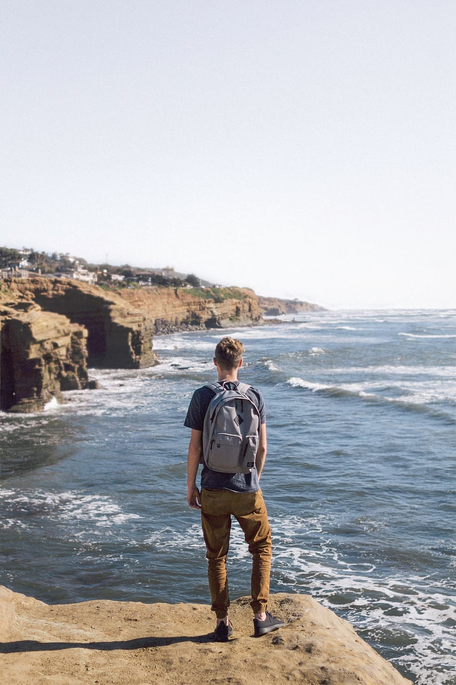 nature, water, edge, waves, people, man, guy, travel, backpack HD wallpaper