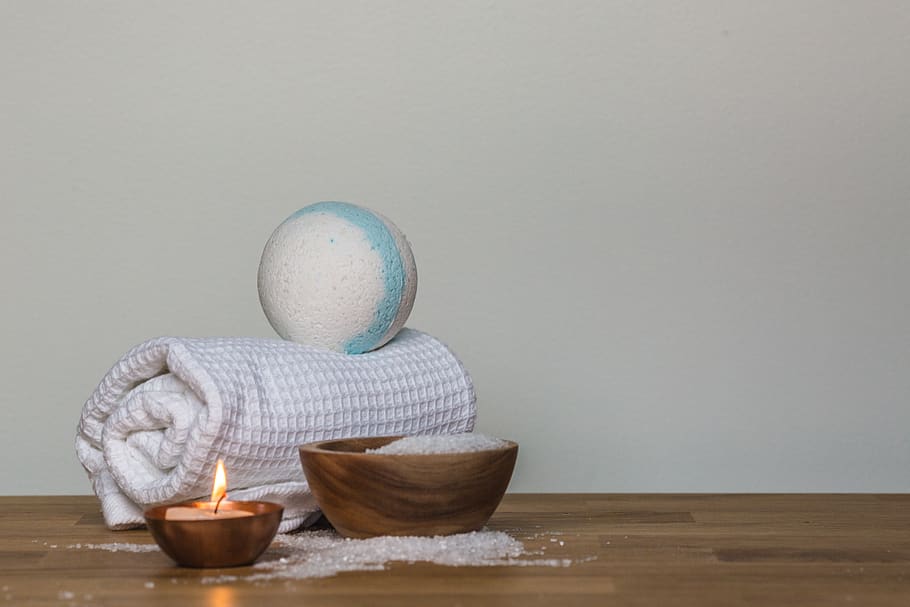 Photo of Towel and Bath Bomb Near Candle, bathbomb, blaze, fire HD wallpaper