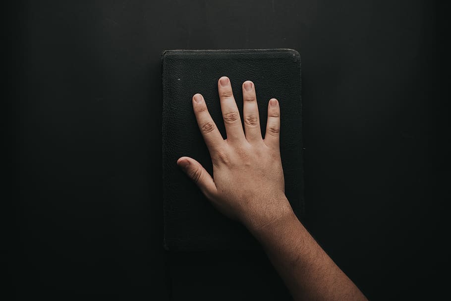 Man Touching Book, bible, fingers, hand, panama, skin, human hand HD wallpaper