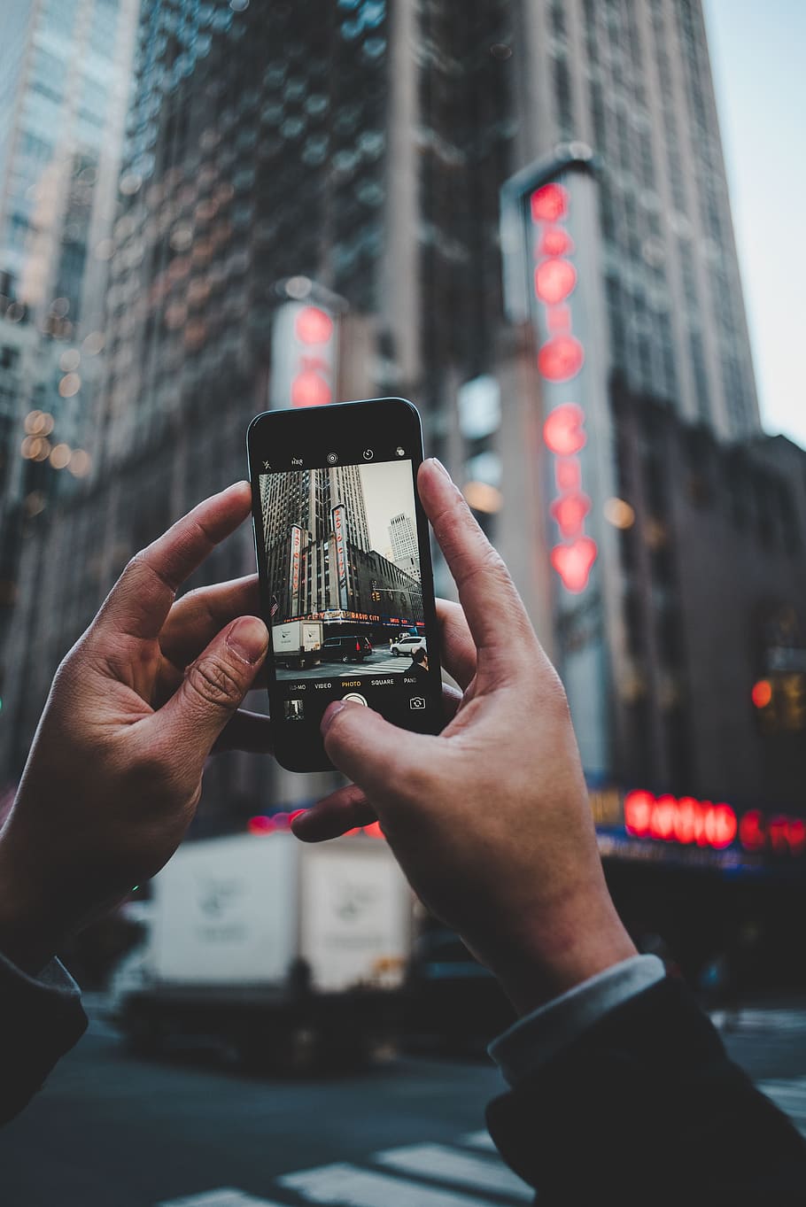 person capturing high-rise building during daytime, phone, hands HD wallpaper