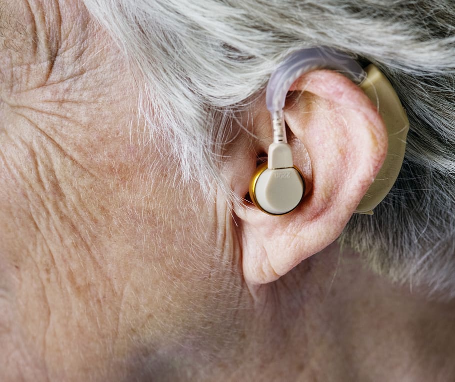 Person Wearing Hearing Aid, accessory, adult, aging, audiology