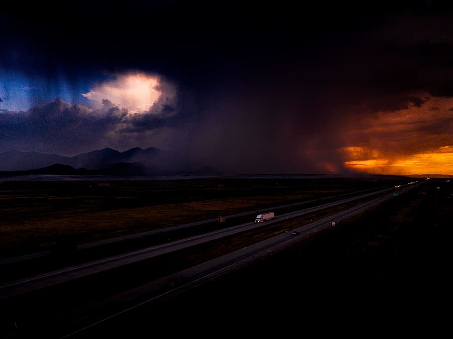 truck moving toward on asphalt high-way road during dawn, street, HD wallpaper