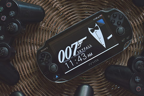 Black Psvita With 007 Skyfall Wallpaper, close-up, electronics HD wallpaper
