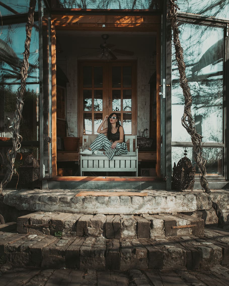 Woman Sitting on Bench, architectural design, architecture, bricks HD wallpaper