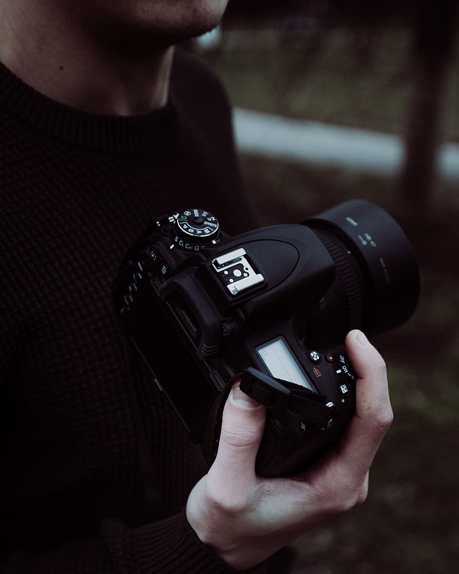 man holding camera, photography themes, camera - photographic equipment HD wallpaper