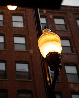 turned on lamp, lampshade, lamp post, brick, light fixture, lantern HD wallpaper
