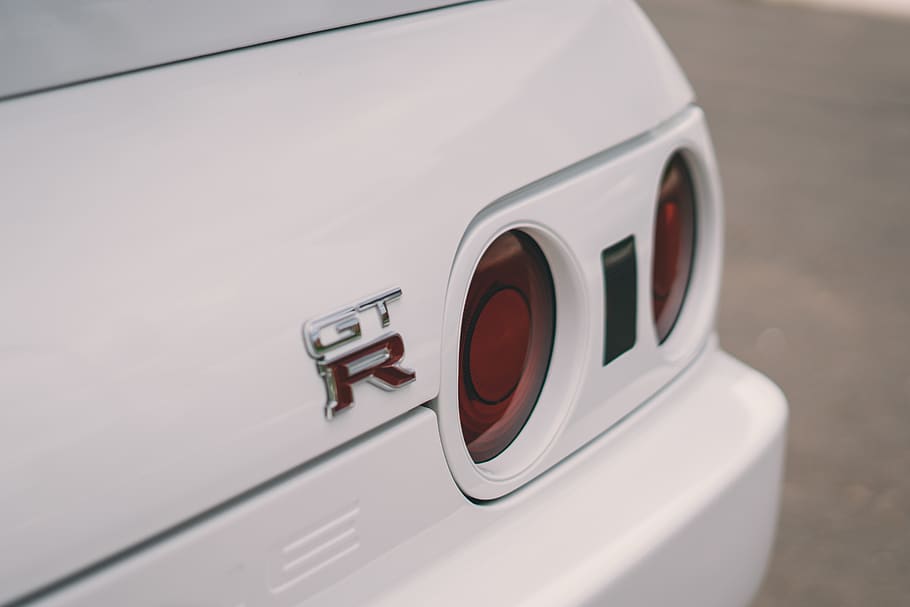 red vehicle tailight, trademark, symbol, logo, tire, grey, emblem HD wallpaper