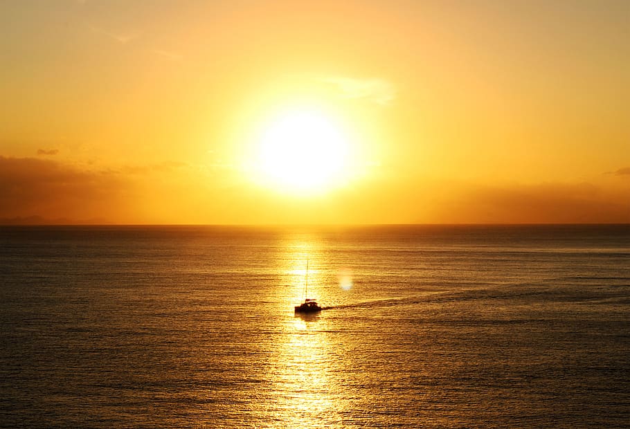 Ocean During Golden Hour, backlit, boat, dawn, sea, sky, sun HD wallpaper