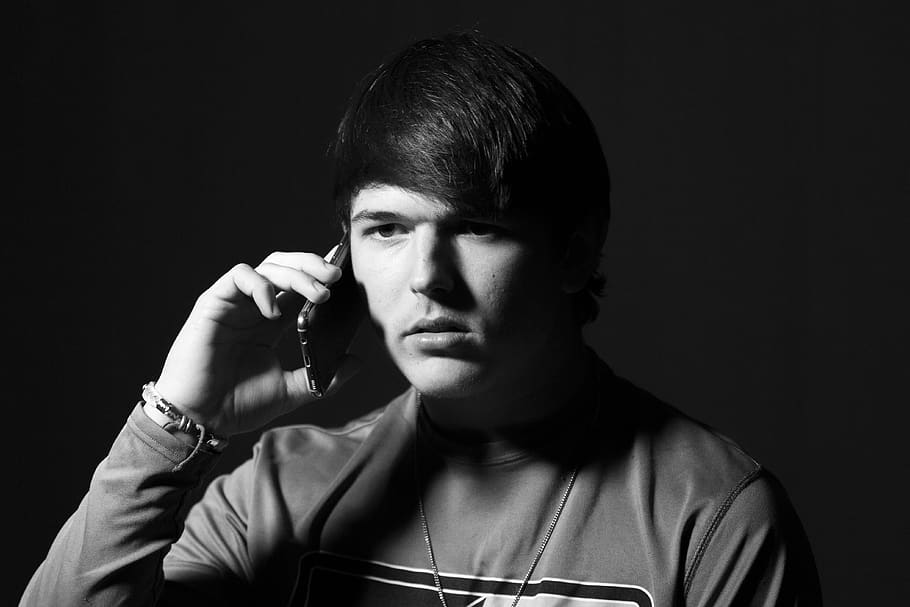 man holding smartphone, person, people, human, face, portrait HD wallpaper