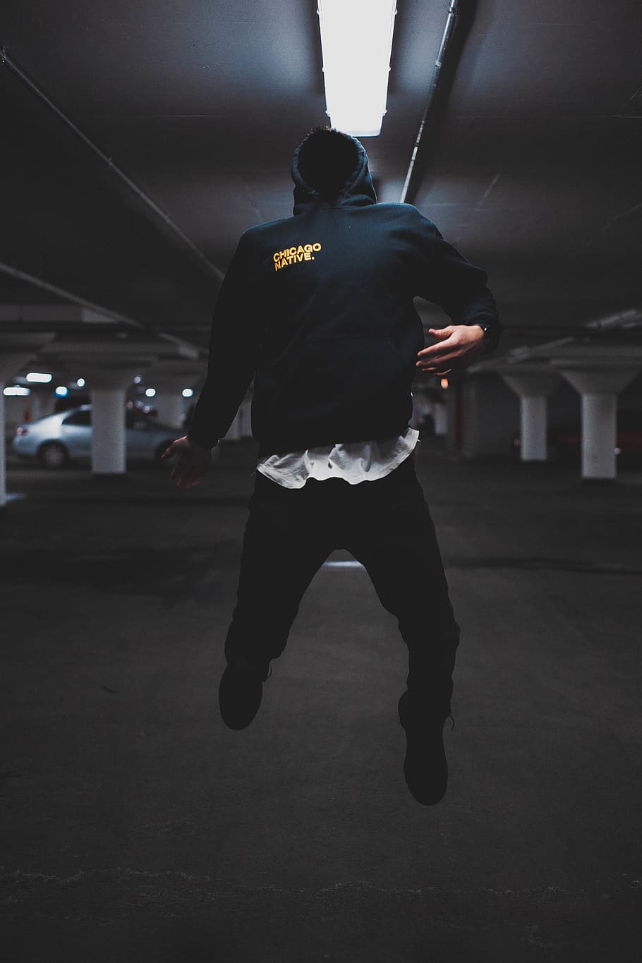 Man Jumping Inside Parking Area, fashion, jump shot, person, style HD wallpaper