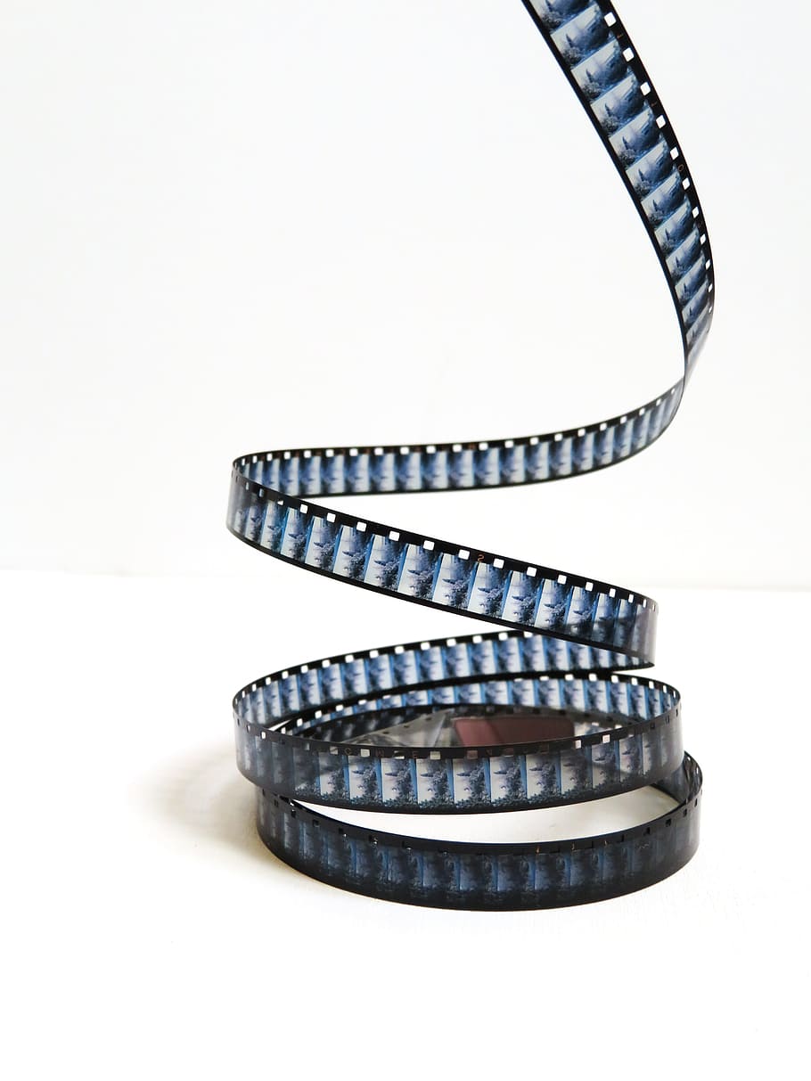 grey movie strip, film, roll, 8mm, 8mm movie roll, old footage