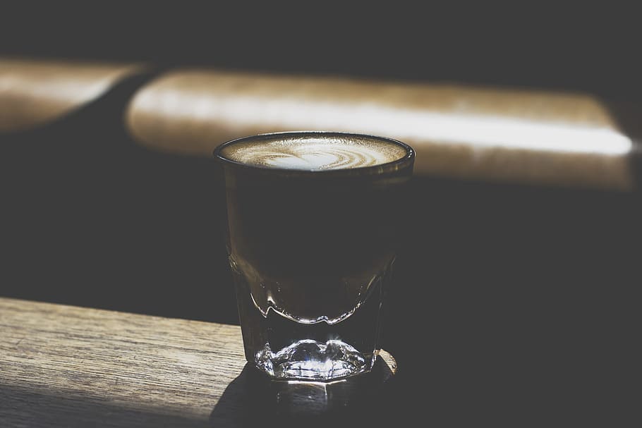 clear drinking glass on table, coffee, dark, light, latte art HD wallpaper