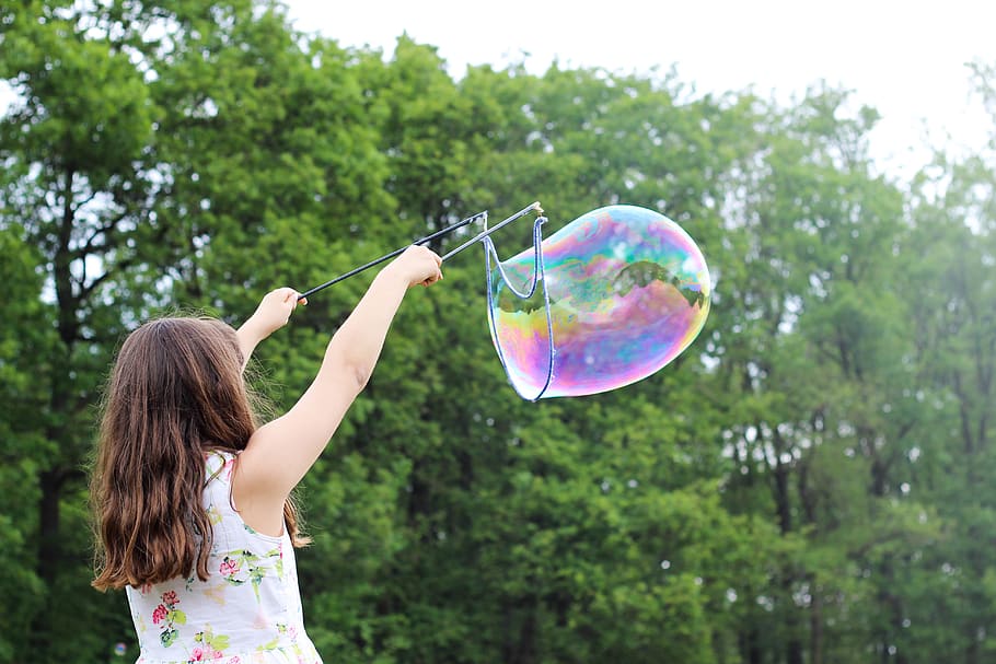 girl making bubbles during daytime, tree, vulnerability, bubble wand HD wallpaper