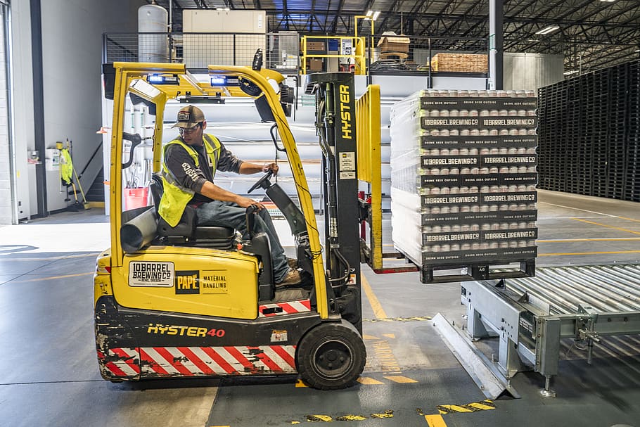 Person Using Forklift, action, container, conveyor, crate, factory