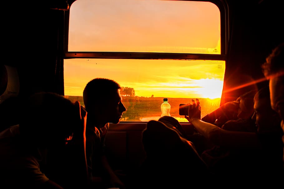 Silhouette of Man Sitting during Sunset, backlit, cellphone, clouds HD wallpaper
