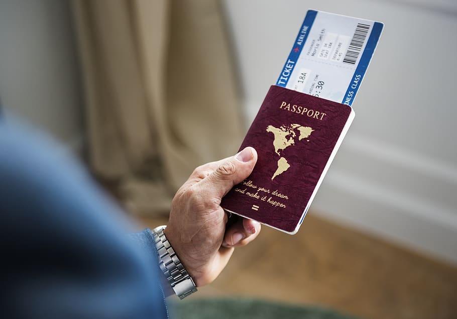 Selective Focus Photography of Person Holding Passport With Ticket, HD wallpaper