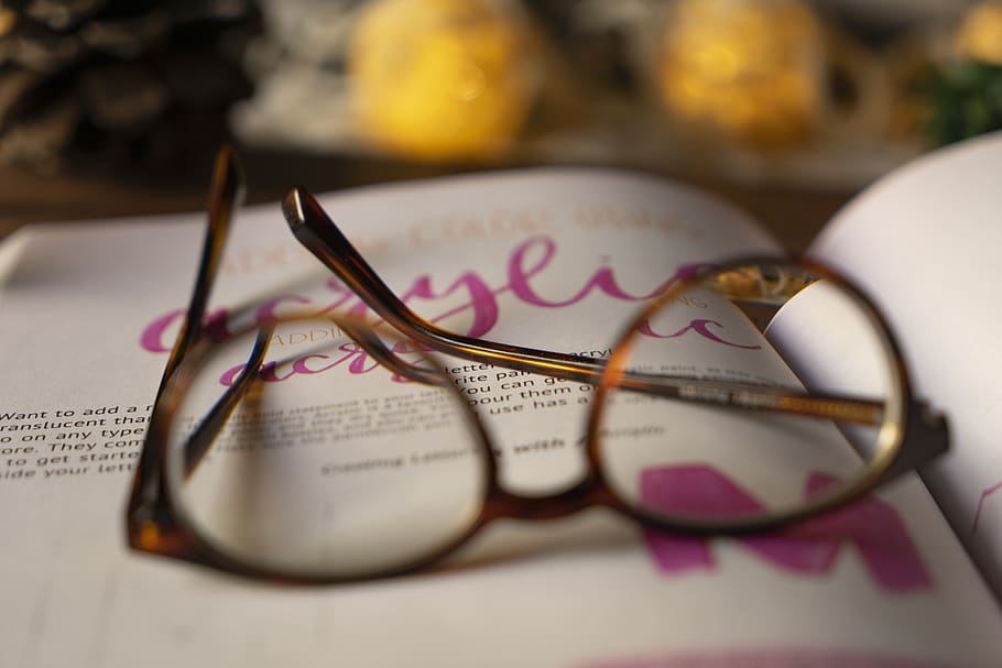 brown framed eyeglasses, text, western script, selective focus HD wallpaper