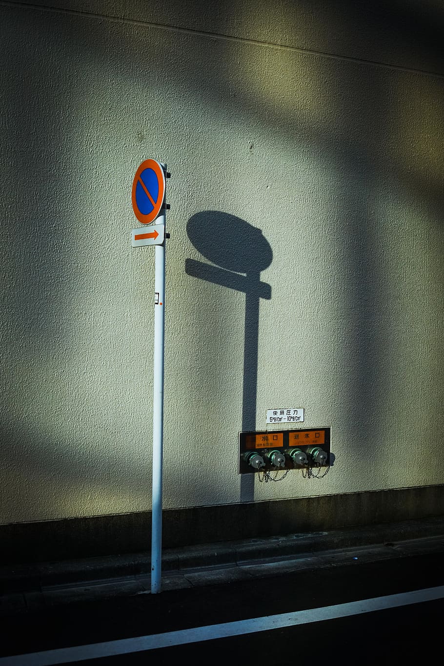 blue and orange signage, shadow, no entry, arrow, direction, street HD wallpaper