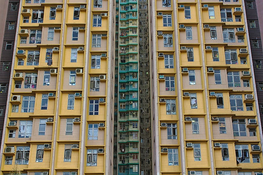 low-angle photography of yellow concrete building, urban, town