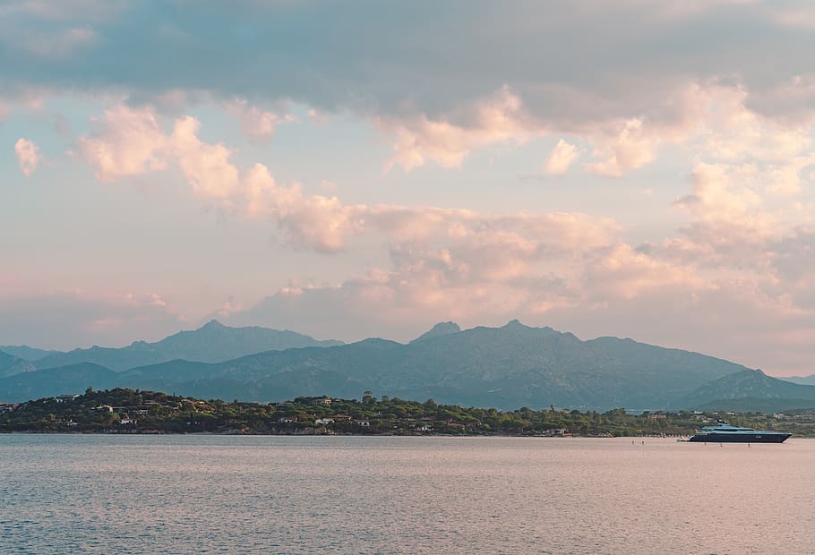 sunset, clouds, mountains, ocean, boat, sky, cloud - sky, water HD wallpaper