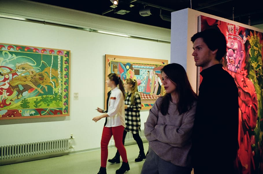 Woman Leaning on Man Standing Inside Room, art, art exhibition