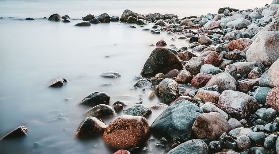 Gray Stones and Body of Water, beach, boulders, daytime, environment HD wallpaper