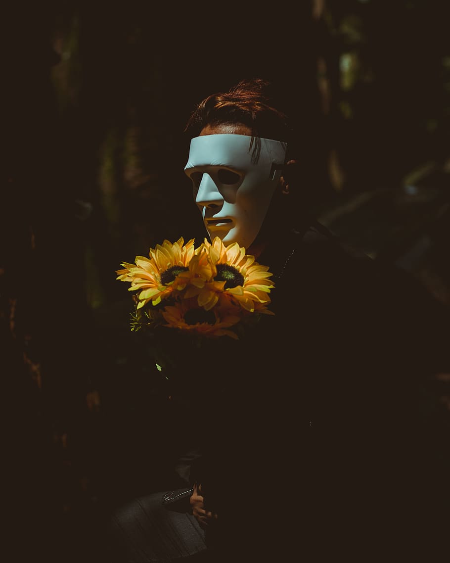 Person Wearing A Mask Holding Sunflowers, creepy, flora, man