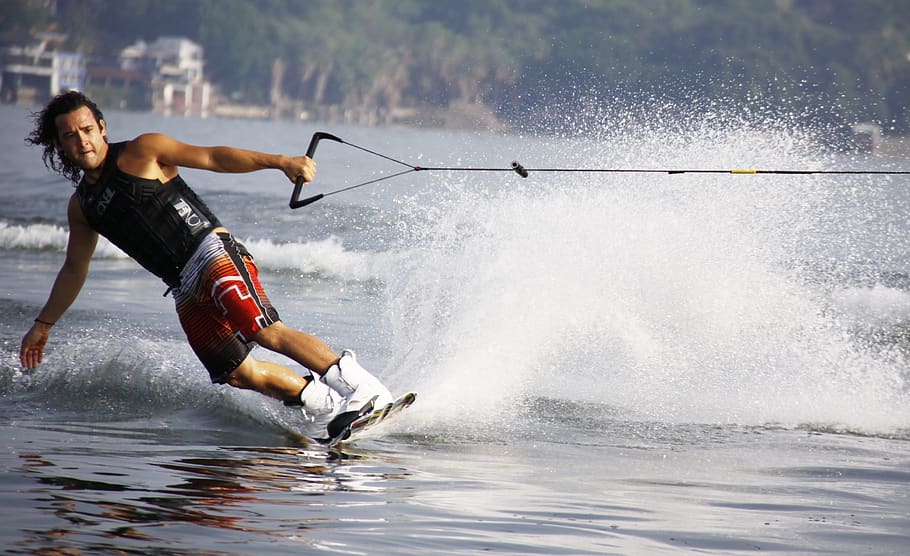 Man in Black Tank Top and Red Shorts Waveboarding, fun, nature HD wallpaper